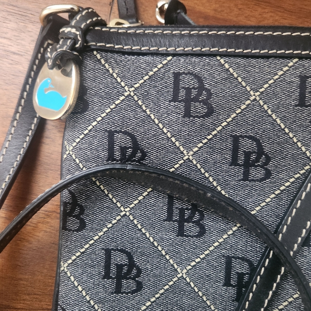 Dooney & Bourke Signature Crossbody Bag. Adjustable leather strap - Picture 9 of 9